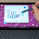 A photo of a person drawing on the Go 3 with a Surface Pen